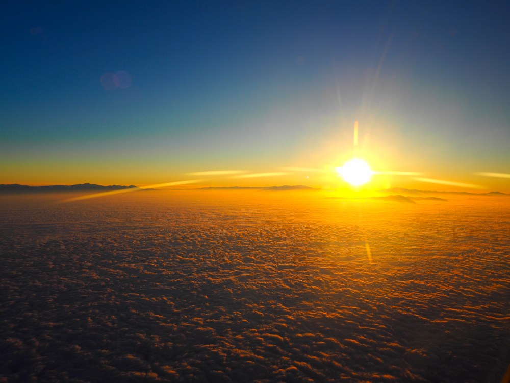 Sunrise over the clouds